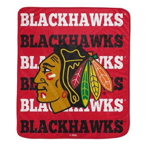 NHL Chicago Blackhawks Repeat Logo Wordmark Ultra Soft Blanket - 1 of 1
