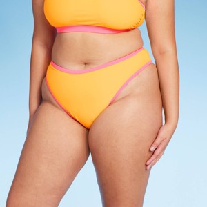 Women's Colorblock Ultra High Leg Extra Cheeky Bikini Bottom - Wild Fable™ Orange/Pink - 1 of 4