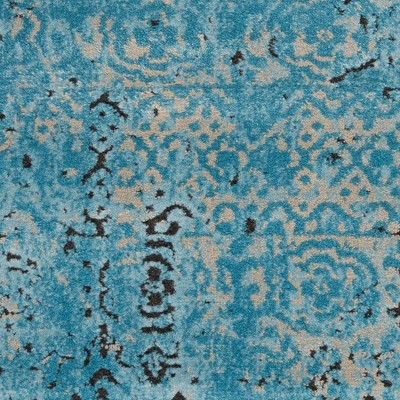 Blue 5' x 7' Stain-Resistant Synthetic Rectangular Area Rug