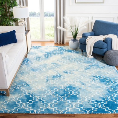 Elegant Blue and Ivory Floral 8' x 10' Hand-Tufted Wool Rug