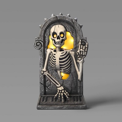 26" Light and Sound Rewind Skeleton Tombstone Halloween Decorative Prop - Hyde and EEK! Boutique™: Haunted Cemetery Decor