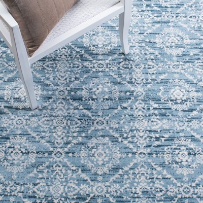 Denim Blue and Ivory Synthetic Round Area Rug