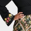 Latino Heritage Month Women's Long Sleeve V-Neck Knit Wrap Top - Black Floral - 4 of 4