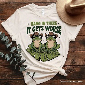 Hang In There It Gets Worse T-Shirt, White and Natural Funny Frog Tee with Dark Millennial Humor| OrnamentallyYou - 1 of 4