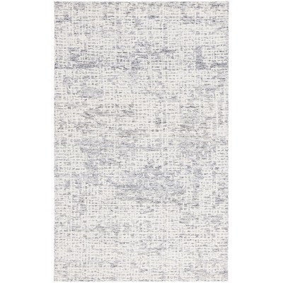 Ebony EBN216 Handmade Tufted Rug - Safavieh