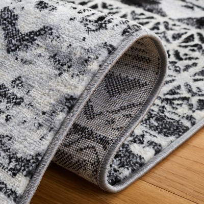 Brentwood Black and Ivory 8' x 10' Synthetic Area Rug
