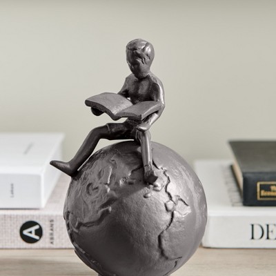 Bronze Cast Iron Boy Reading on Globe Tabletop Sculpture