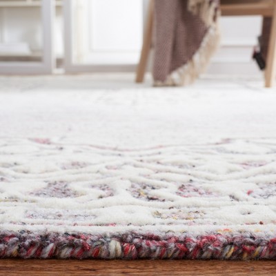 Handmade Red and Ivory Floral Wool Area Rug