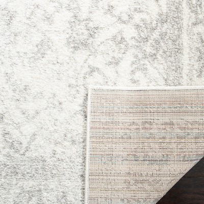 Ivory & Silver Oriental Distressed 30" Synthetic Area Rug