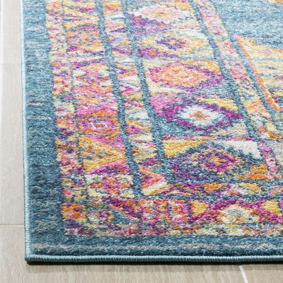 Light Blue and Orange Synthetic Easy Care Area Rug, 6' x 9'