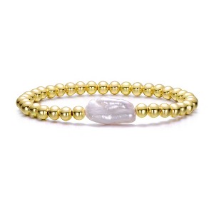 Baroque White Pearl Ball Bead Link Stretchable Layering Bracelet, featuring luxurious pearls and a flexible design for effortless layering elegance. - 1 of 2