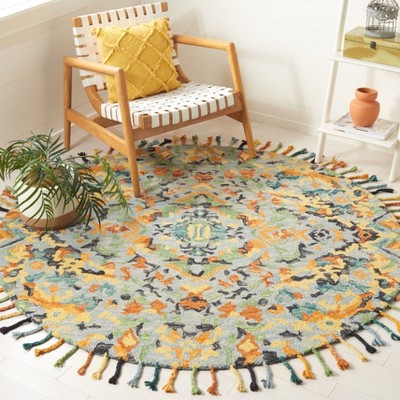 Handmade Blue Floral Wool Round Tufted Area Rug with Tassels
