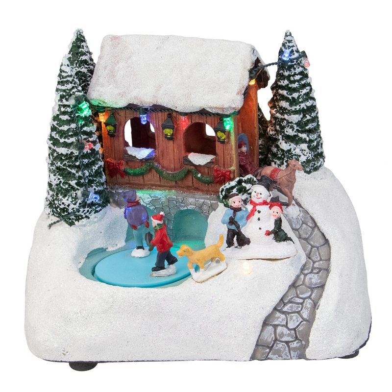 Northlight 7.5" White Lighted LED Musical Christmas Ice Skating Village Tabletop Decor, 1 of 7