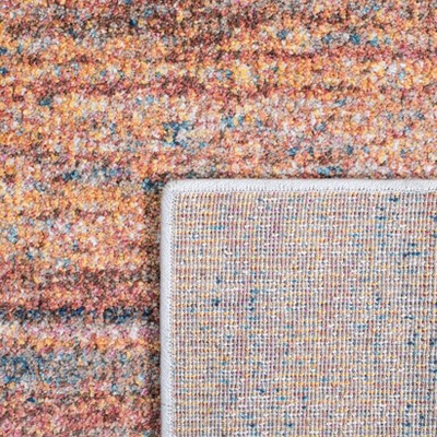 Rust and Blue Abstract Rectangular Synthetic Area Rug