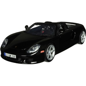 Porsche Carrera GT Convertible Black with Black Interior 1/18 Diecast Model Car by Motormax - 1 of 3
