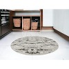 HomeRoots 4' Black and Off White Round Abstract Washable Non Skid Area Rug - 2 of 4