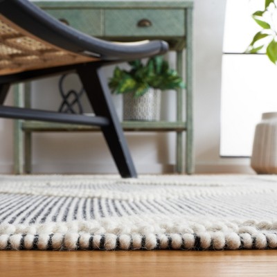 Marbella Black and Ivory Flat Woven Wool Area Rug