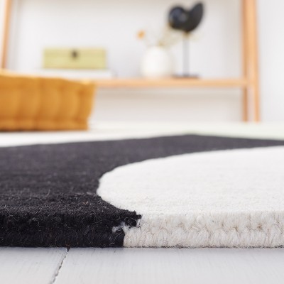 Rodeo Drive Black and Green Hand-Tufted Wool Area Rug