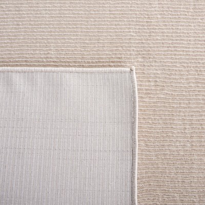 Elegant Beige Synthetic 31'' Rectangular Easy-Care Area Rug