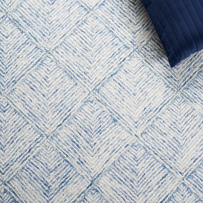 Handmade Blue and Ivory Wool Abstract Tufted Area Rug 5' x 8'