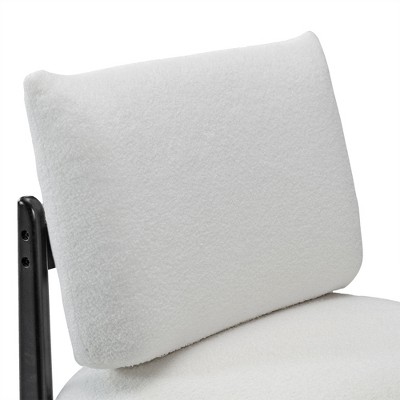 Close-up of chair seat and side with black wooden leg