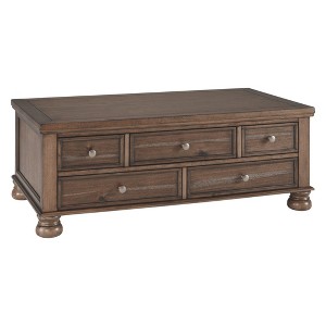 Flynnter Cocktail Table with Storage Medium Brown - Signature Design by Ashley