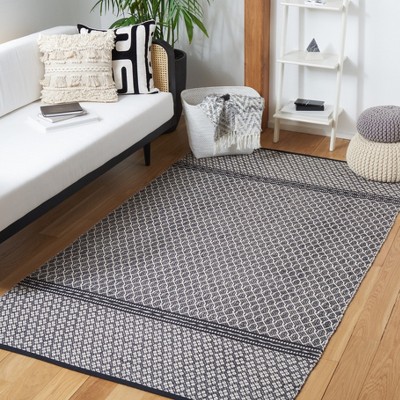 Handmade Black and Ivory Wool Flat Woven Reversible Rug, 4' x 6'
