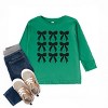 The Juniper Shop Coquette Black Bows Collage Distressed Toddler Long Sleeve Tee - 3 of 4
