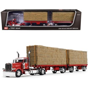 Peterbilt 389 Day Cab with Utility Dual 28.5' Flatbed with Hay Viper Red with Graphics 1/64 Diecast Model by DCP/First Gear - 1 of 3