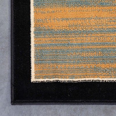 Reversible Geometric Blue Synthetic 5' x 7' Area Rug