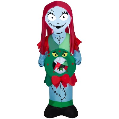 Gemmy Christmas Inflatable Sally in Patchwork Dress with Monster Wreath, 5 ft Tall, Multi