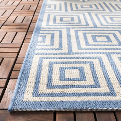 Handmade Cream & Blue Geometric Synthetic Area Rug, 4' x 6'