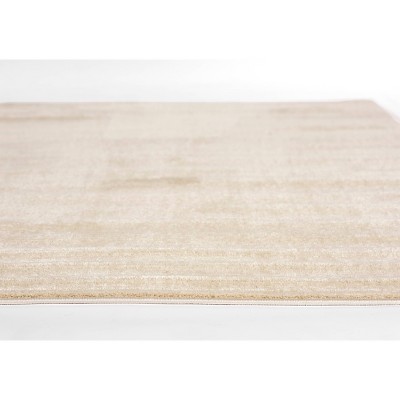 Ivory Rectangular Stain-Resistant Synthetic Area Rug 7'10" x 10'