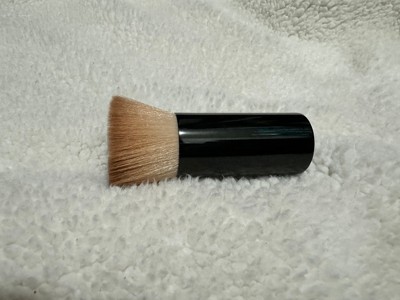 Buff on powder foundation with bareMinerals Handy Buki Brush.