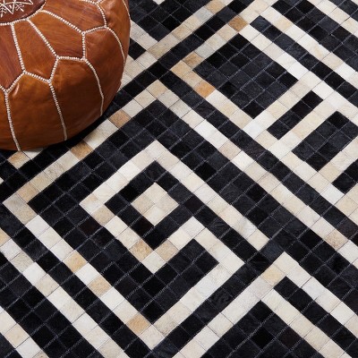 Handmade Black and Ivory Geometric Cowhide Area Rug