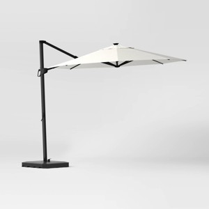 10' Round Solid Solar Offset Outdoor Patio Cantilever Umbrella with Black Pole - Threshold™ - 1 of 4