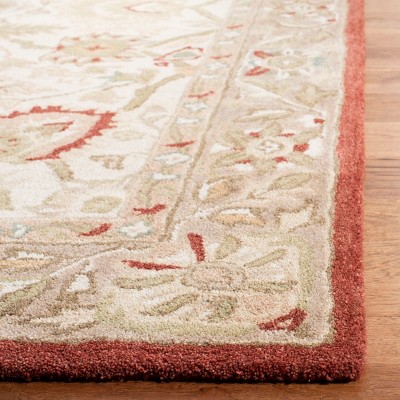 Handmade Floral Elegance Wool Area Rug 6' x 9' in Beige and Rust
