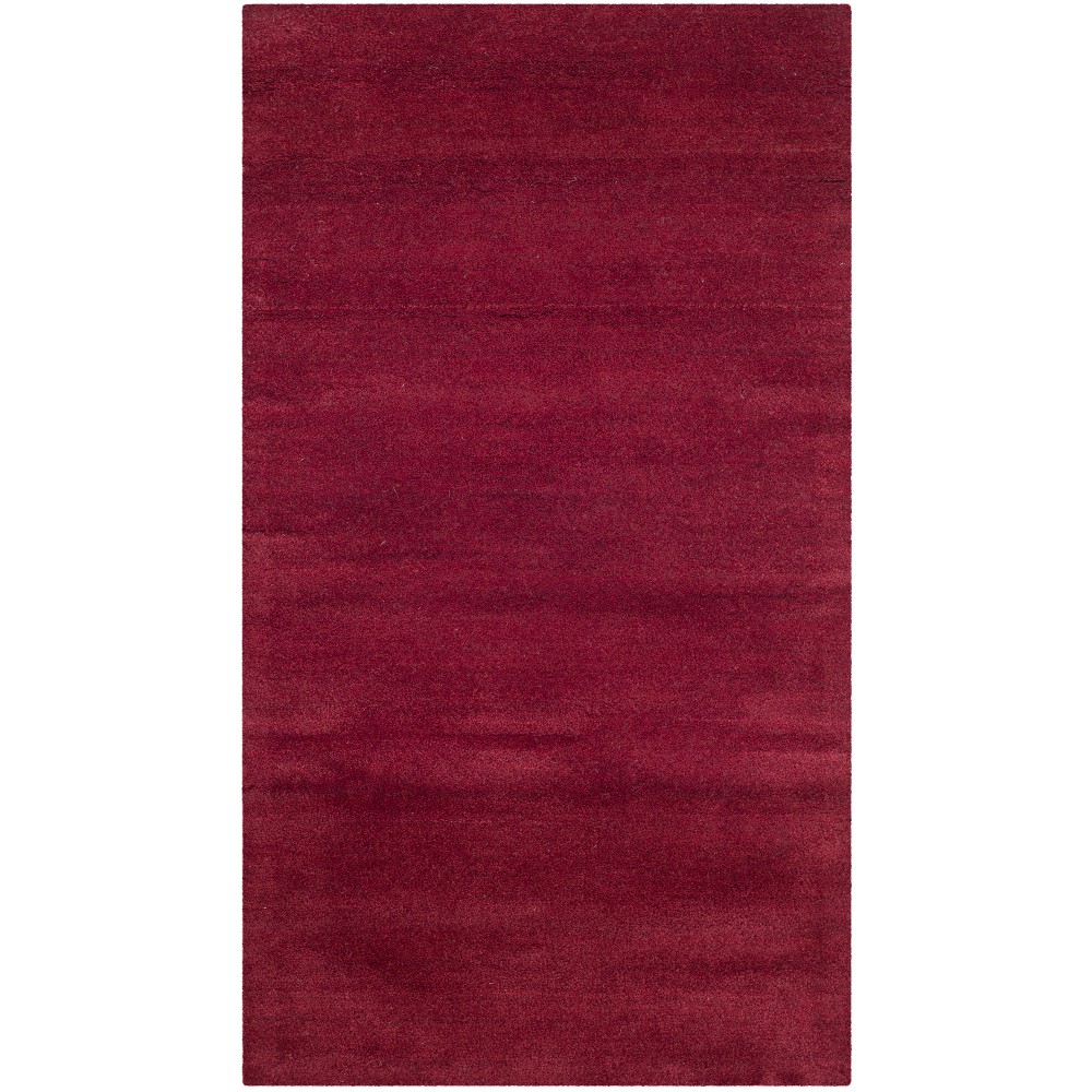  Solid Tufted Accent Rug Red