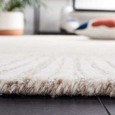 Natural Ivory Handmade Wool Tufted Abstract Rug 5' x 8'
