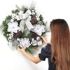 Christmas Wreath with Lights, featuring artificial antler and pinecone baubles, battery-operated, for decorating front doors, walls and windows. - 4 of 4