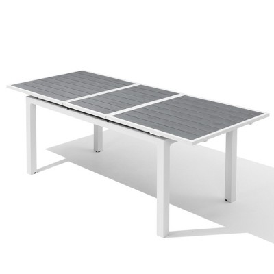 Crestlive Products Outdoor Dining Table, 63"-83" Patio Extendable Dining Table with Wooden-Like Top and White Aluminum Frame