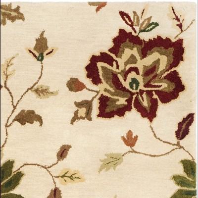 Ivory and Multicolor Floral Tufted Wool 4' x 6' Area Rug