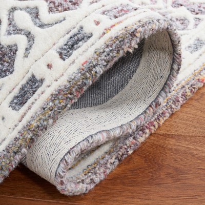 Handmade Red and Ivory Floral Wool Area Rug