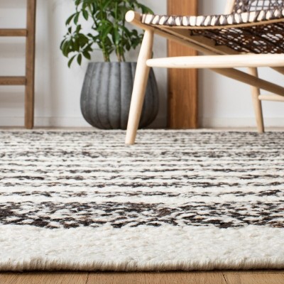 Black and Ivory Round Handwoven Wool Cotton Area Rug