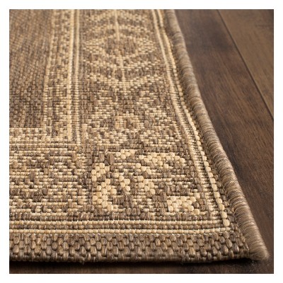 '6'7''X9'6'' Rectangle Herning Outdoor Rug Brown/Natural - Safavieh, Size: 6'7'' X 9'6'', Brown / Natural'