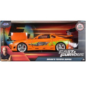 Brian's Toyota Supra Orange with Graphics "Fast & Furious" Movie 1/24 Diecast Model Car by Jada - 1 of 3