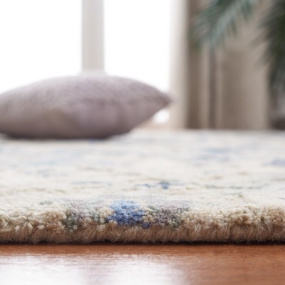 Blue and Beige Hand-Tufted Wool 6' x 9' Area Rug