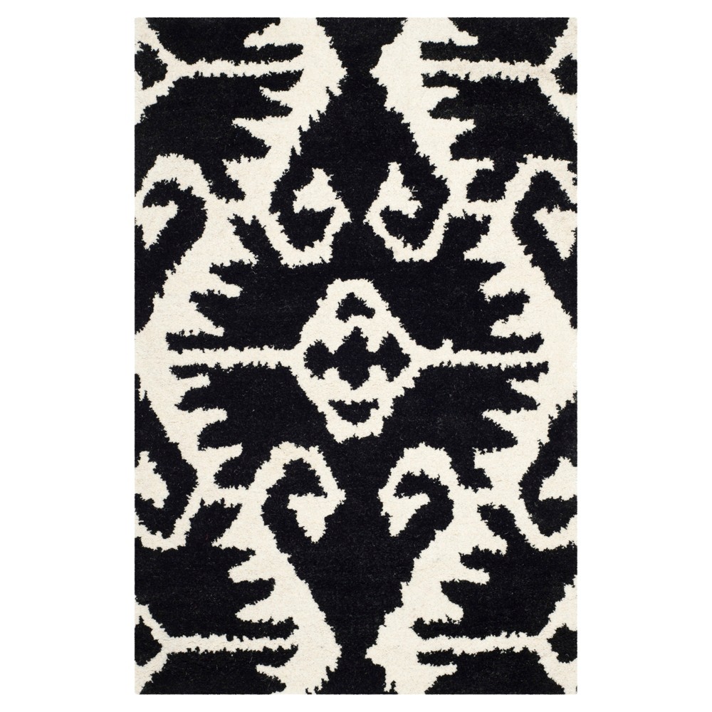 Garrard Area Rug - Black/Ivory (2'6inx4') - Safavieh