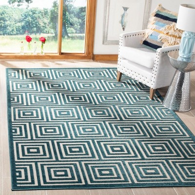 Cottage Elegance 79'' Cream & Turquoise Synthetic Area Rug