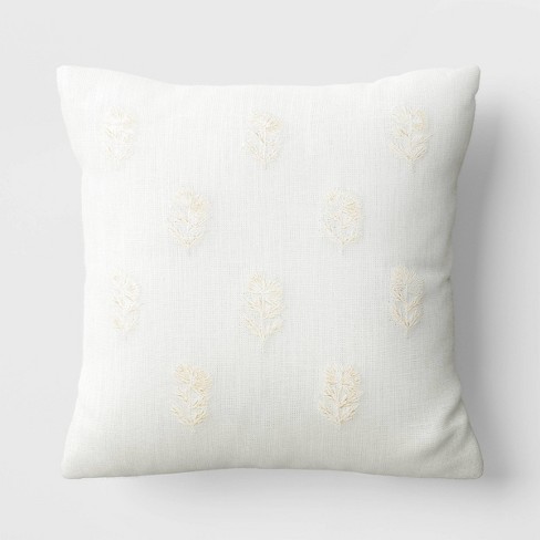 White embroidered 2025 throw pillow